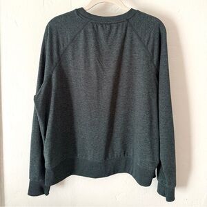 Quince Pullover Crew. Color: Heather Green.